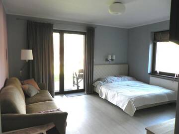 Фото номера Апартаменты Апартаменты Wodamoja - apartamenty nad jeziorem г. Ставигуда 21